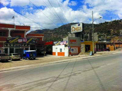 Power lines run across a road in the small Honduran town of Catacamas. (Fergus Inder)