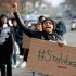 Thousands of Americans rally at a national march against police violence, Dec. 13, 2014 in Washington D.C.The families of Michael Brown, Eric Garner, and Akai Gurley's domestic partner marched alongside protesters.