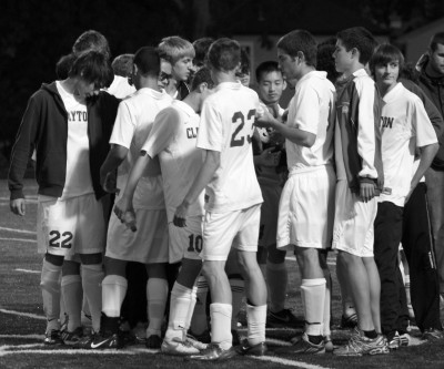 The Hounds huddle before the start of the second half of a game.  The team is off to a 16-2-2 record.
