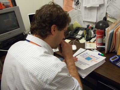 NCA Accreditation History teacher and CHS Academics Director Josh Meyers reviews the School District’s 2009-2010 budget in preparation for NCA’s March 2 and 3 visit and evaluation. (Eve Root)