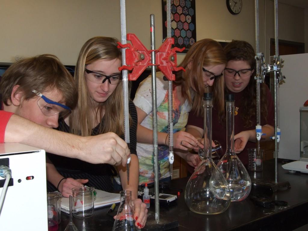 Juniors from the AP Chemistry class practice for the Battle of the Burets competition. (Elizabeth Sikora)