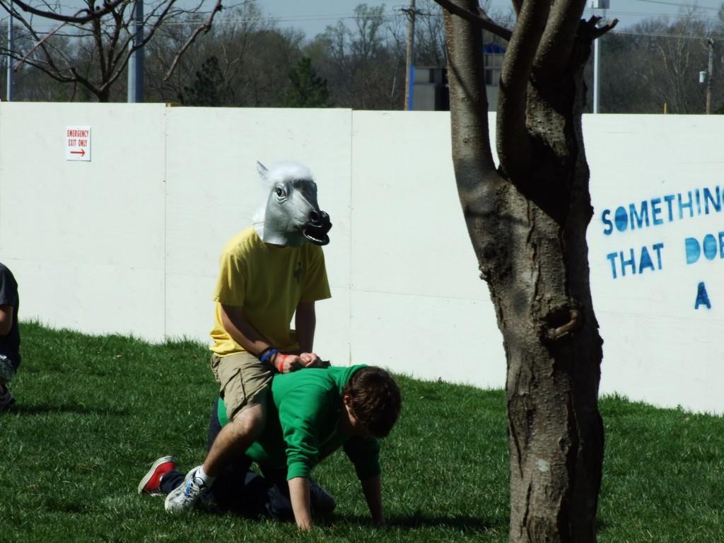 Teddy Kogos and Robbie Love play an April Fool's Day prank in the quad. (Madeleine Fleming)