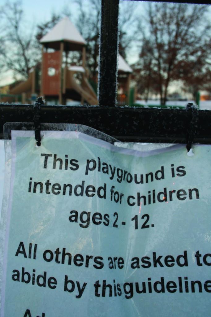 A sign now warns students that the new Shaw Park playground is off-limits to teenagers. The Parks and Rec. Department says that the jungle gym is not safe or appropriate forthose over the age of 12. (Paul Lisker)