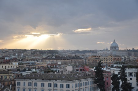 The sun breaks through the clouds and shines down on the Vatican in Rome, Italy. (Zachary Praiss)