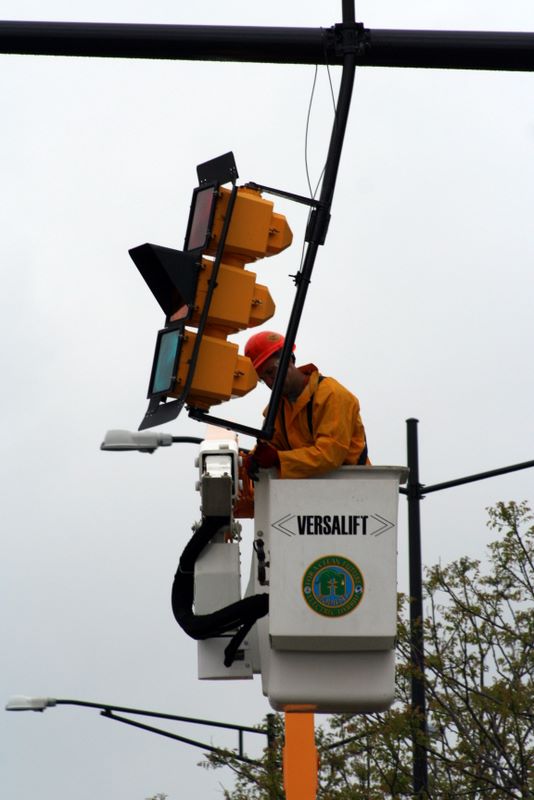 Slowly, traffic light by traffic light, the city is being restored; meanwhile, however, the residents live on without electricity as they recover from the unforgiving tempest.