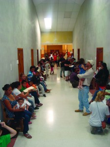Patients crowd a hallway of El Hospital Santo Pedro Hermano as they wait for treatment. (Paul Lisker)
