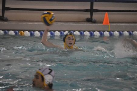 Sophomore Jack Layden looks for a teammate to pass to at a recent Clayton water polo match. (Elizabeth Sikora)