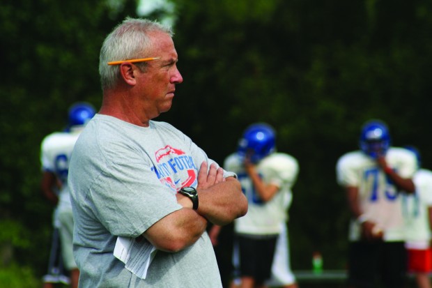 Football Coach Scott Weissman looks on as the team practices on Aug. 10. (All photos by Paul Lisker)