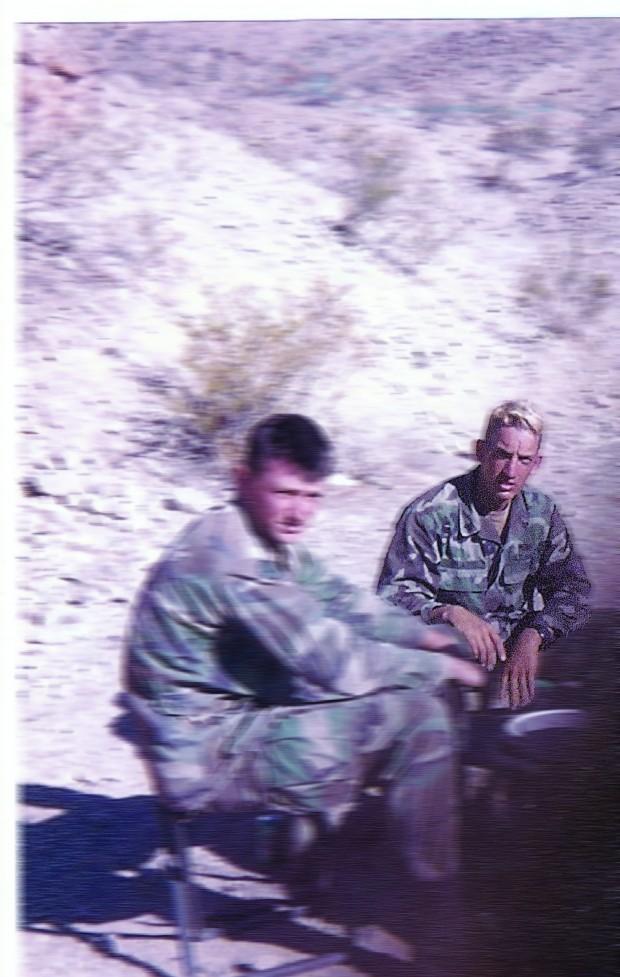 Student Resource Officer John Zlatic sits with a fellow soldier in the mountains of Afghanistan.  Zlatic was a linguist in the Special Forces during the 1990s. (Courtesy of John Zlatic)