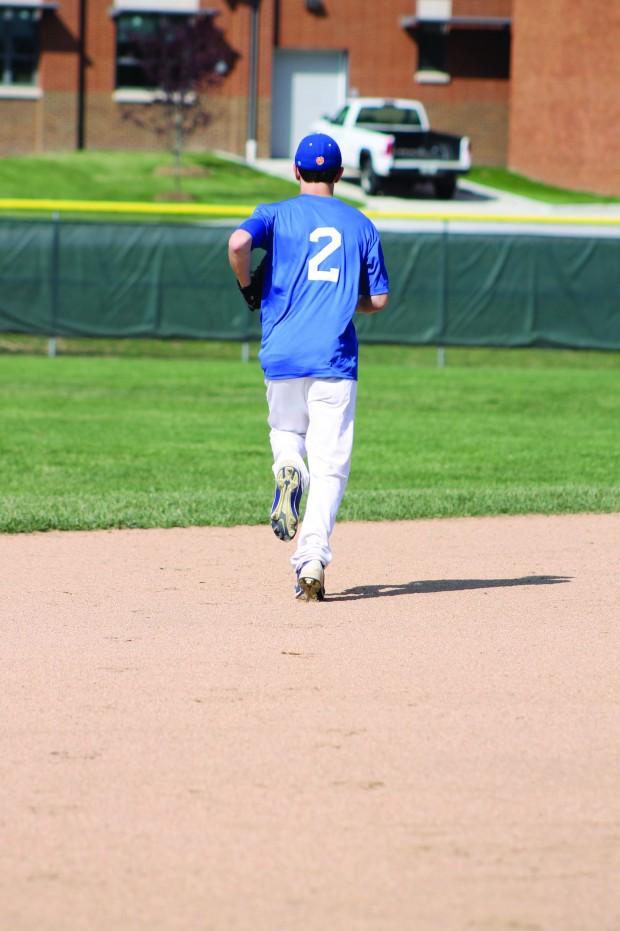 Phillips runs out to his center field position. (Emma Vierod)