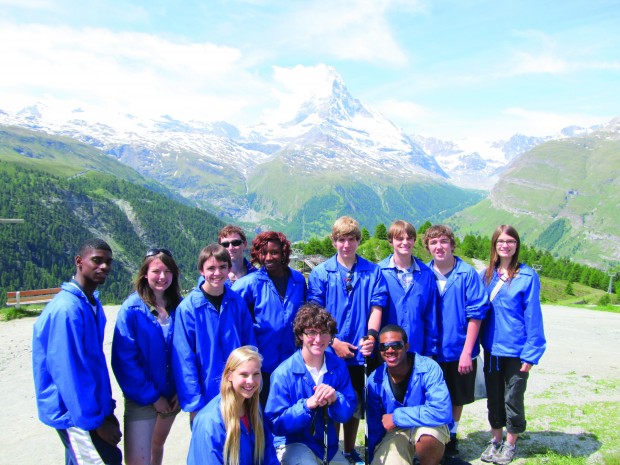 CHS students smile at the camera in front of the Matterhorn