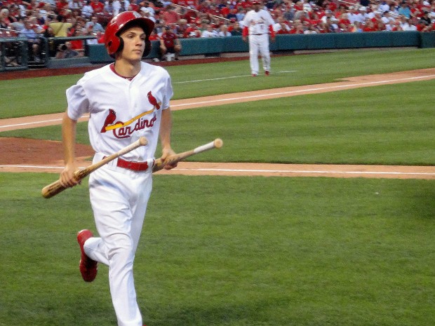 Greg Ginos (senior) is working as the Cardinals bat boy. (Photo by Peter Baugh)