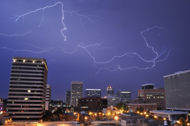 A terrible lightning strike lights up the sky over downtown Clayton one stormy night in August. Some of the storms in the Saint Louis area recently have been devastating, damaging a lot of houses and property. Photo by William Wysession.