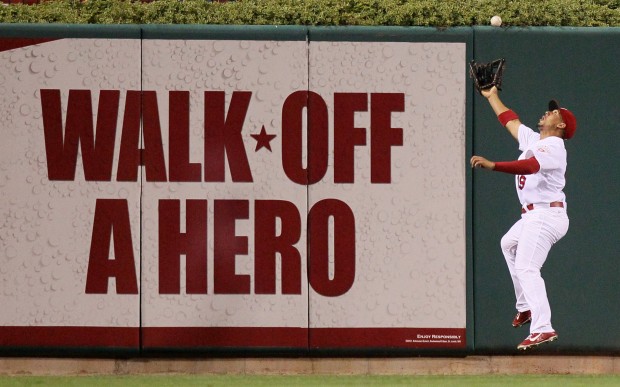 St. Louis Cardinals center fielder Jon Jay catches a fly ball at the warning track off the bat of the Arizona Diamondbacks' Stephen Drew to end the top of the fifth inning on Tuesday, August 14, 2012, at Busch Stadium in St. Louis, Missouri. (Chris Lee/St. Louis Post-Dispatch/MCT)