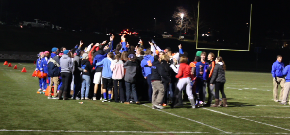 Clayton fans cheer on the Hounds in the district championship.
