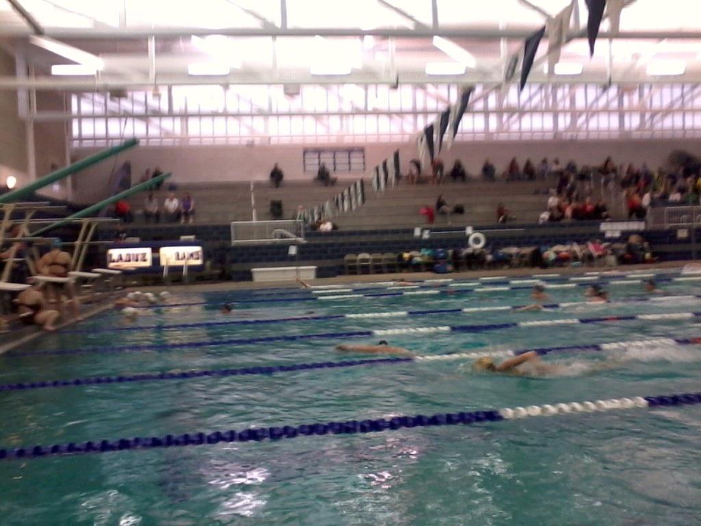 The girls' swim team prepares for the Ladue Invitational. Photo by Peter Baugh. 