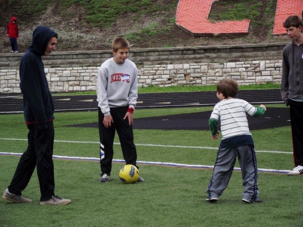 CHS students volunteer at a soccer clinic for kids with autism. The clinic was held by Volunteen, and organized by Clayton student Sophia Rotman. Photo by Rebecca Stiffelman