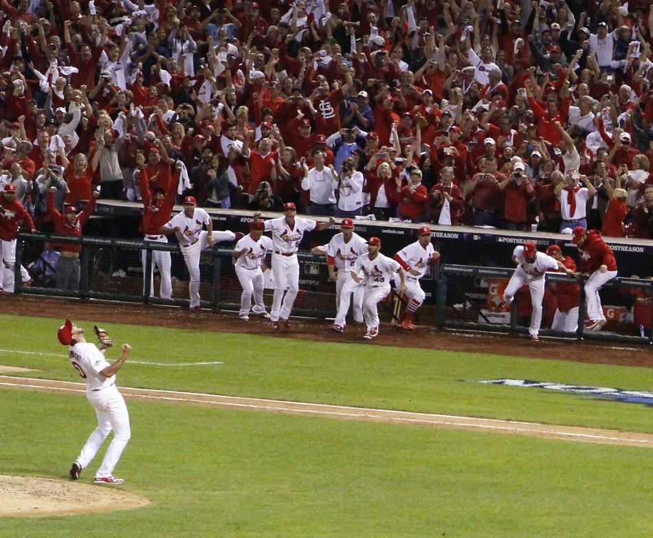 The St. Louis Cardinals Adam Wainwright begins the celebration of his 6-1 complete-game victory to eliminate the Pittsburgh Pirates in Game 5 of the National League Division Series at Busch Stadium in St. Louis, Missouri, on Wednesday, October 9, 2013. (Chris Lee/St. Louis Post-Dispatch/MCT)