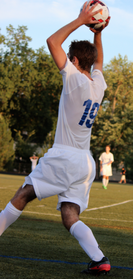 Tim Nonet throws the ball in at Clayton's home game against Vianney. The Hound's had a disappointing loss 2-0, but everyone played their hardest all the way until the end of the game.