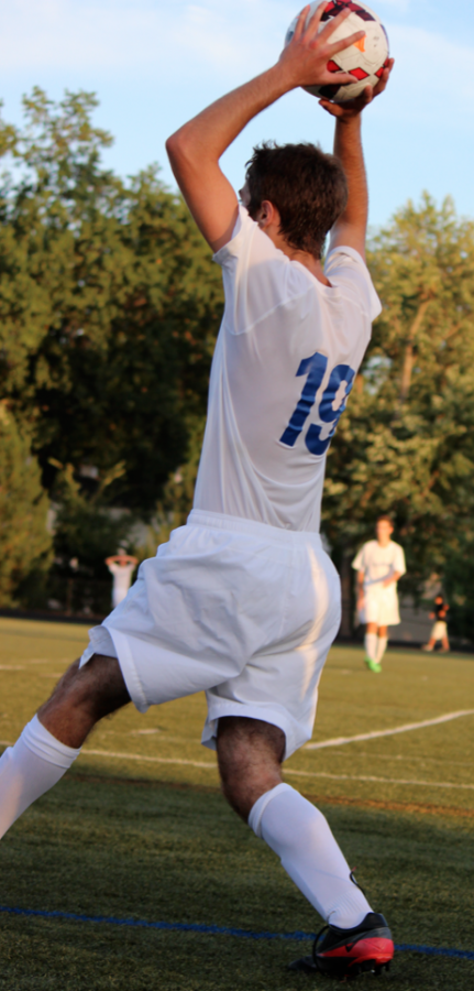 Tim Nonet throws the ball in at Claytons home game against Vianney. The Hounds had a disappointing loss 2-0, but everyone played their hardest all the way until the end of the game.