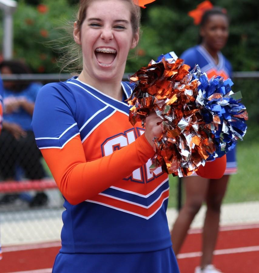 Junior Kate ODonnell is thrilled to be cheering on the Hounds at their away game at Jennings. The Hounds had a very close loss but Kate is still enjoying her first year on the cheer squad.