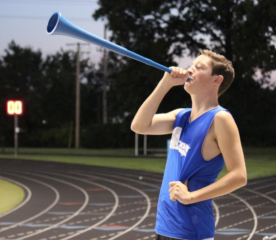 Junior Brian Gatter supports the Hounds at one of the Boys Varsity soccer's first home games. Gatter is at every home game he can go to, and always with his vuvuzela.