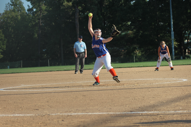 Sophomore Emily Sharp throwing a fastball. 