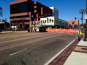 Barricades and police vehicles can be found along Central Avenue in downtown Clayton. (photo by Alex Bernard)