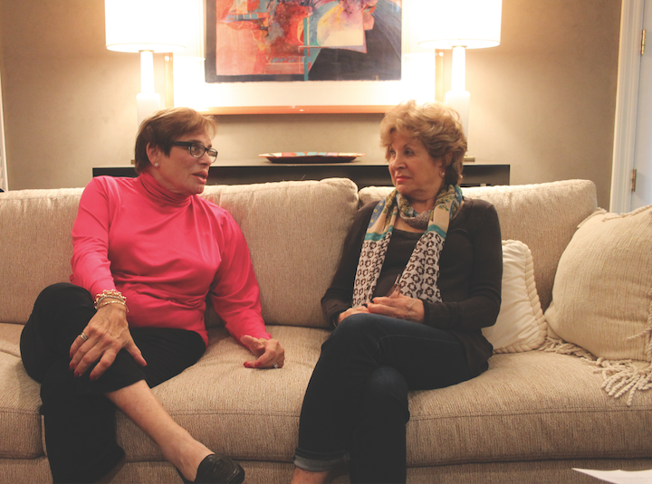 Suzy Seldin and Sally Rosenthal chat in Seldin's Clayton home.