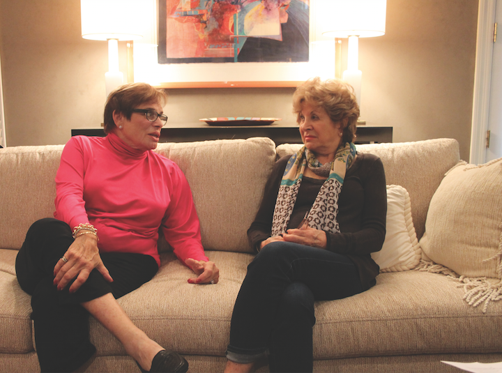 Suzy Seldin and Sally Rosenthal chat in Seldins Clayton home.