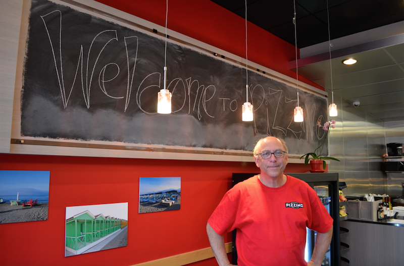 Jim Zimmerman, owner of Pizzino, in his restaurant.