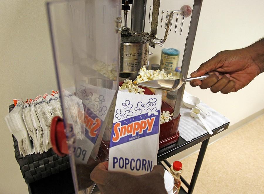 While the AMC Dine-in Services have much more to offer than popcorn, the classically tasty snack almost never disappoints (Charles Trainor Jr./Miami Herald/MCT).