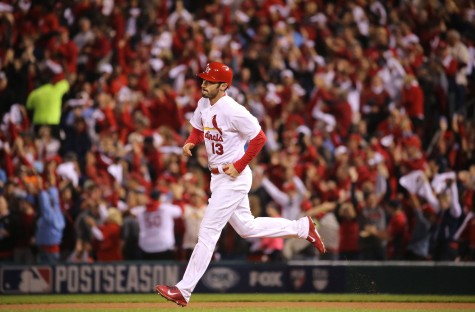 Matt Carpenter rounds the bases after hitting a postseason home run for the St. Louis Cardinals