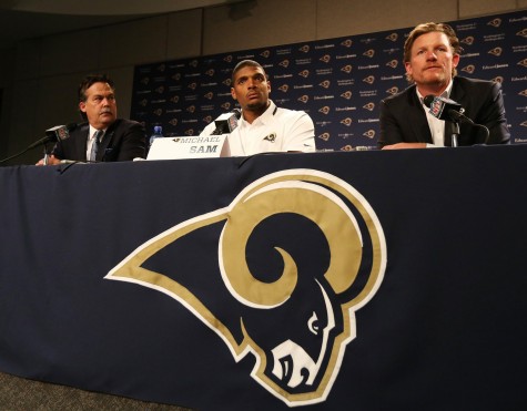 St. Louis Rams defensive end Michael Sam with head coach Jeff Fisher, left, and general manager Les Snead during an introductory press conference on Tuesday, May 13, 2014, at Rams Park in Earth City, Mo. (Chris Lee/St. Louis Post-Dispatch/MCT)