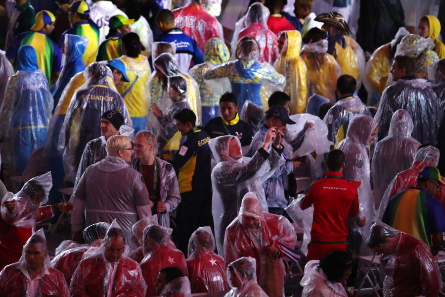 Athletes from numerous countries mingle in the rain as the Rio 2016 Closing Ceremony continues on Sunday, Aug. 21, 2016 at Maracan in Brazil. (Robert Gauthier/Los Angeles Times/TNS)