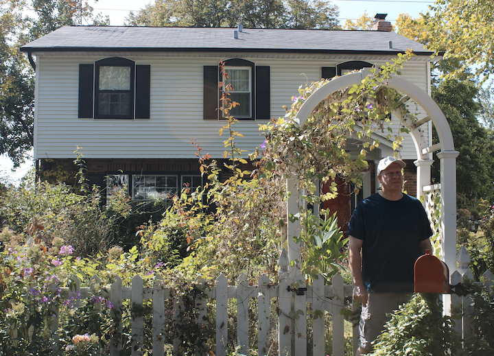 Kordenbrock in front of his home in Ladue