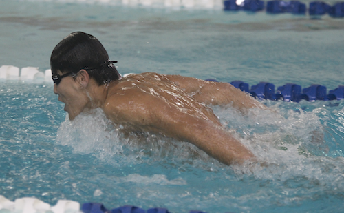 Tiger Chen at a boys varsity swimming meet. 