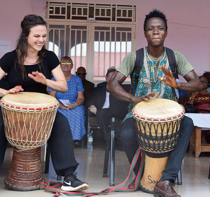 Einstein playing the drums with one of the village locals. Photo from Einstein.