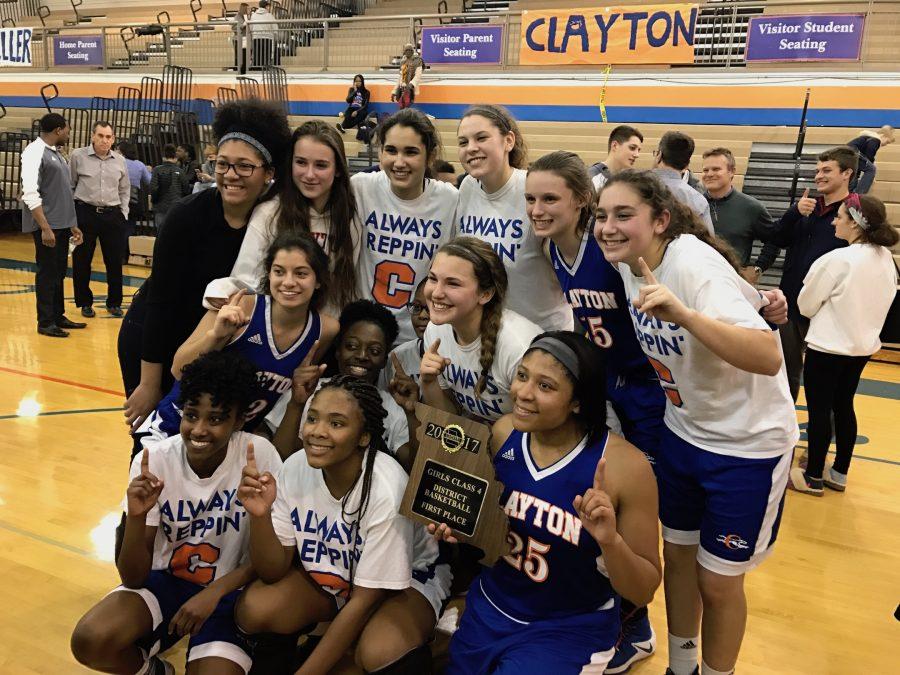 Lady Greyhounds after their District championship win against Miller Career Academy