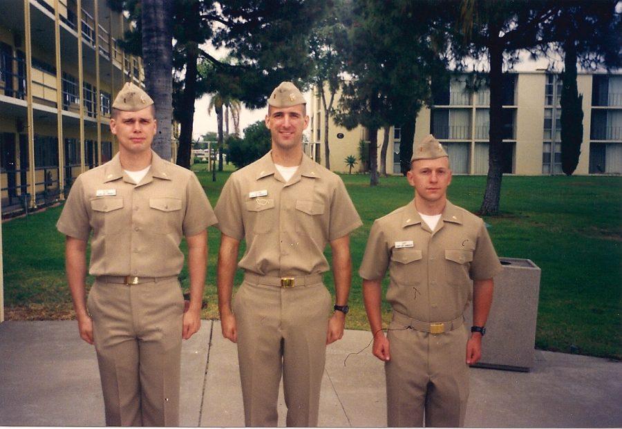 Brad Krone (center) and two of his comrades stand outside a Naval Base in San Diego. Photos from Krone.
