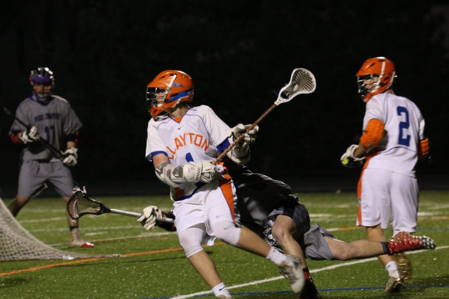 Sophomore Trystan Goette carries the ball toward goal