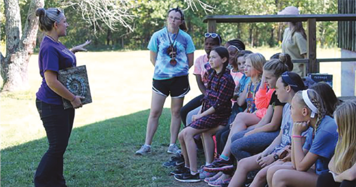 6th grade campers with counselor and instructor. 