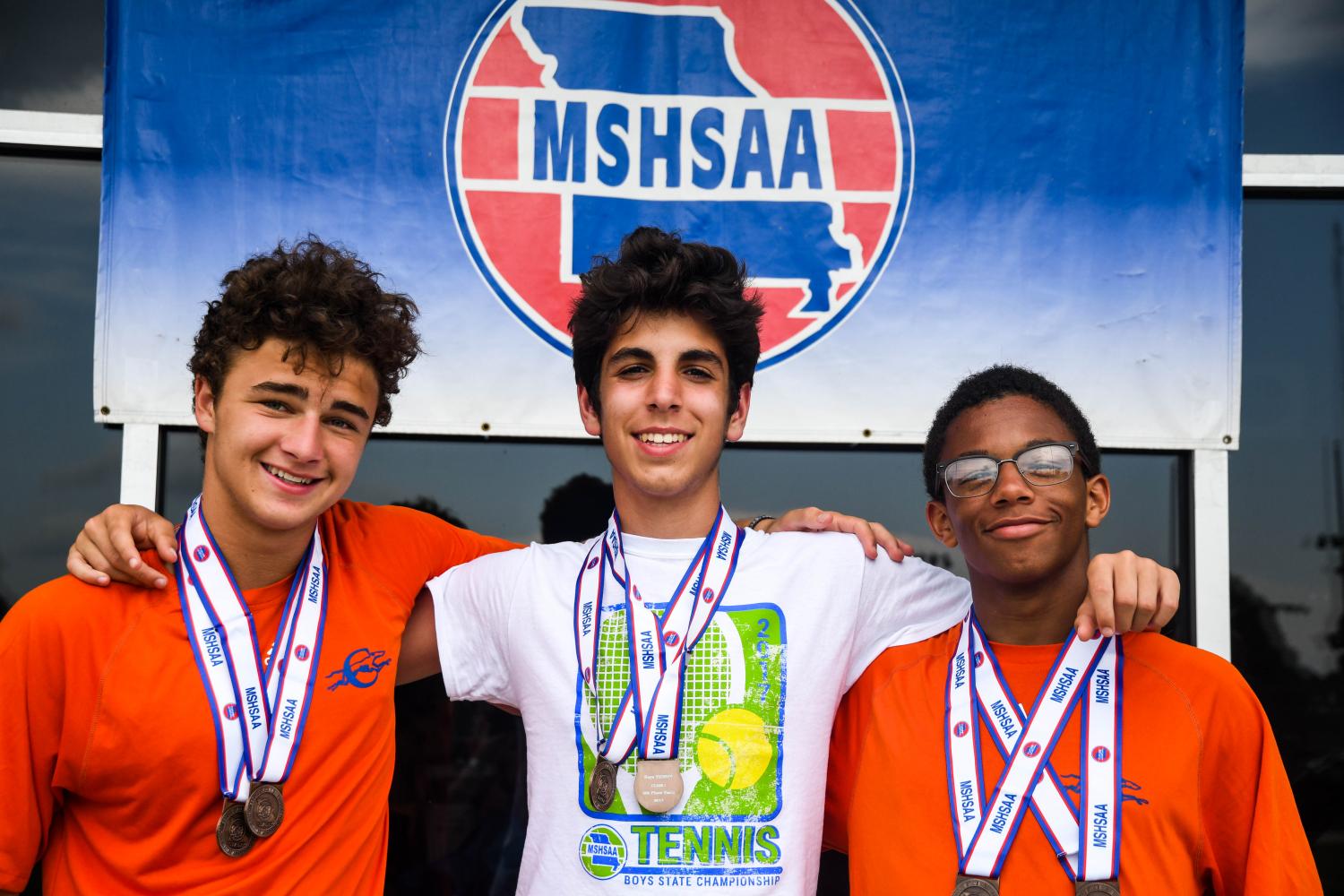 CHS boys' varsity tennis team after state tournament. Erik James (left), Noah Brown (middle), and Angelo Vidal (right). Photo by Michael Melinger.