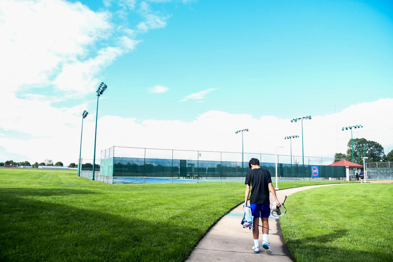 Junior Noah Brown heads to a tennis court in Springfield, MO to practice before this weekends state competition on May 24. 