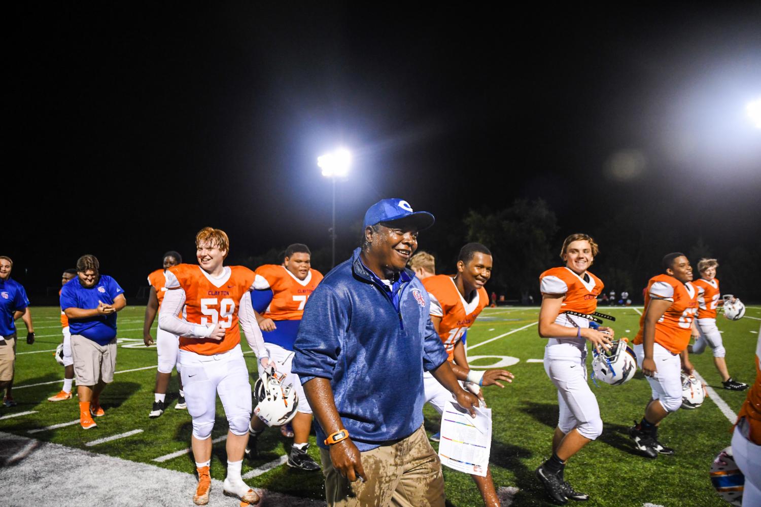 Photographer+Michael+Melinger+captures+Coach+Barnes+after+a+game.