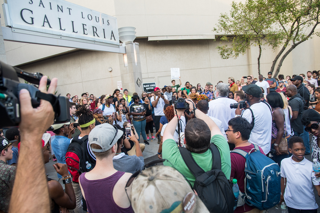 Protesters gather outside of the St. Louis Galleria following last weeks acquittal of a white St. Louis police officer in the shooting death of a black suspect.