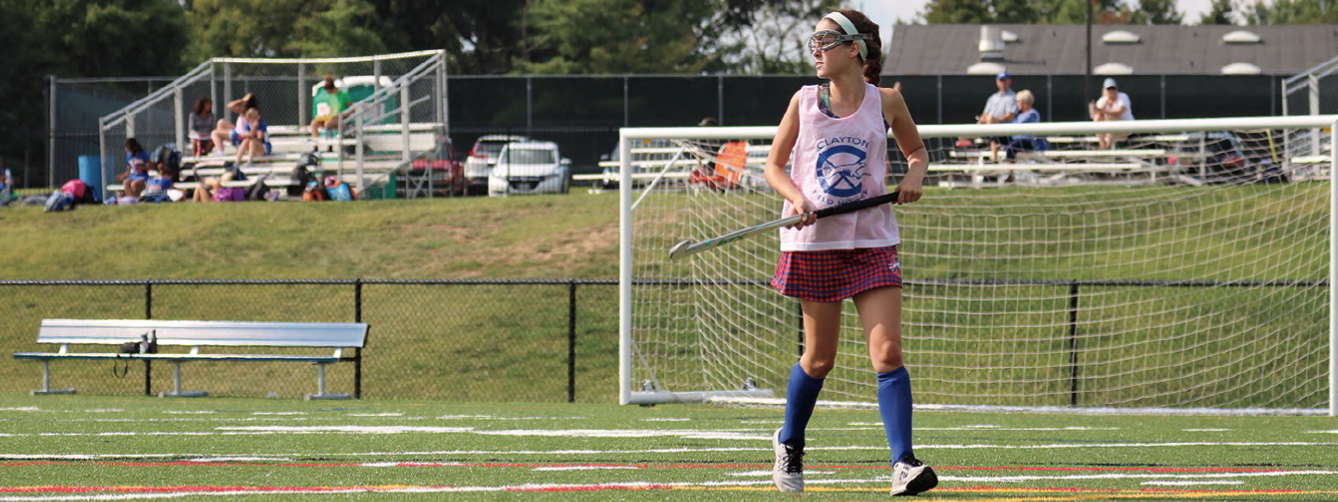 Kate Cooper in a field hockey game.