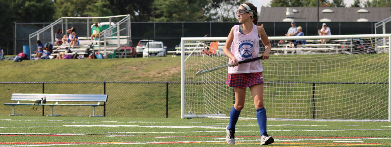 Kate+Cooper+in+a+field+hockey+game.