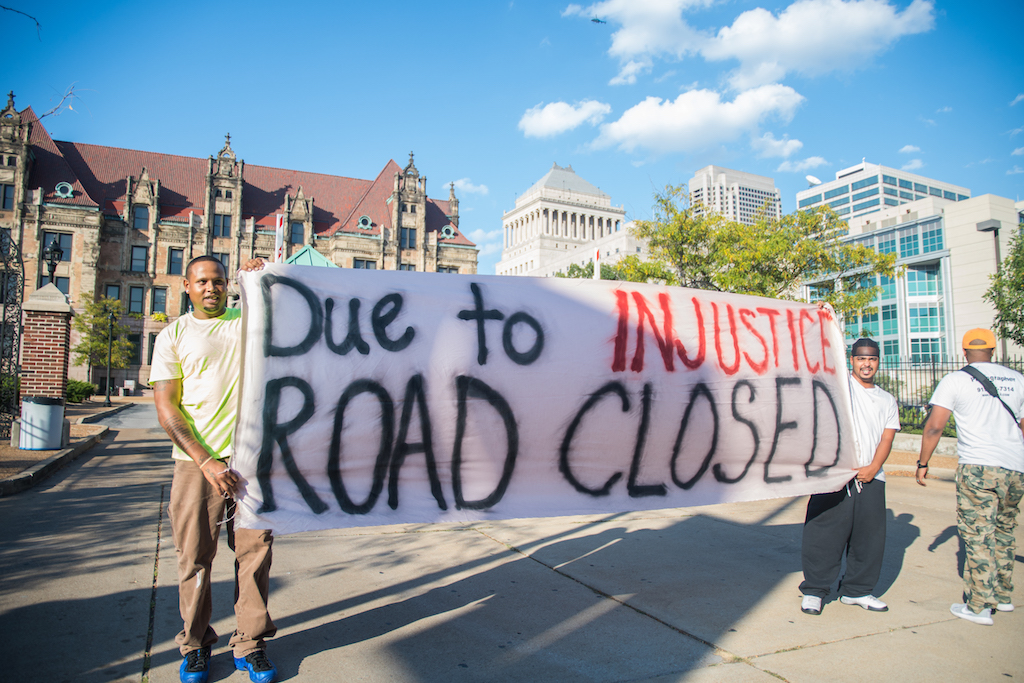 Protesters walk the streets of downtown St. Louis on September 15.