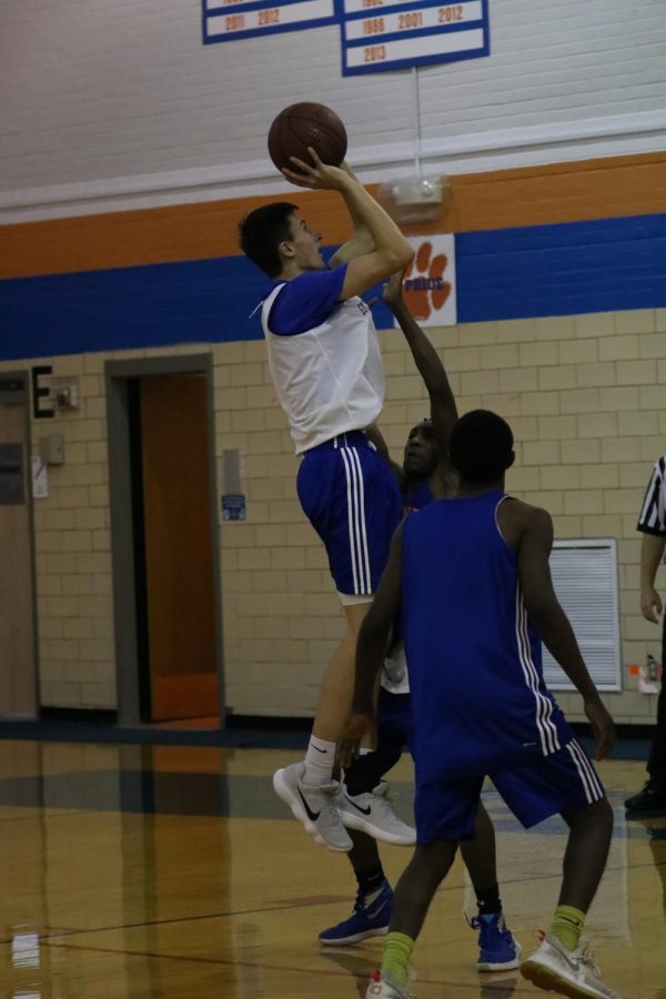 Heusel goes for a shot in practice in Stuber Gym.